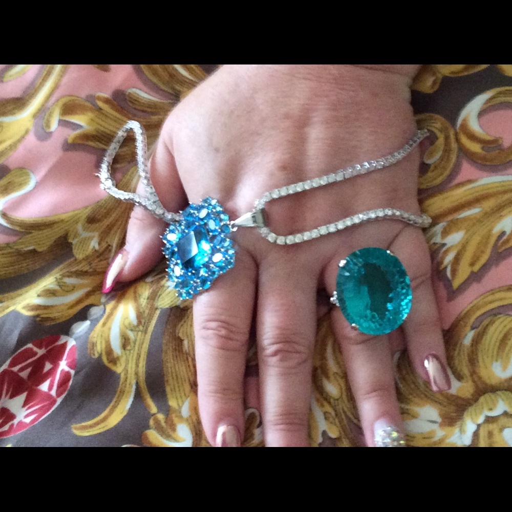 Huge 200+ carat ring, tennis necklace , and charm